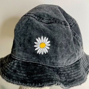 Black denim bucket hat with embroidered daisy